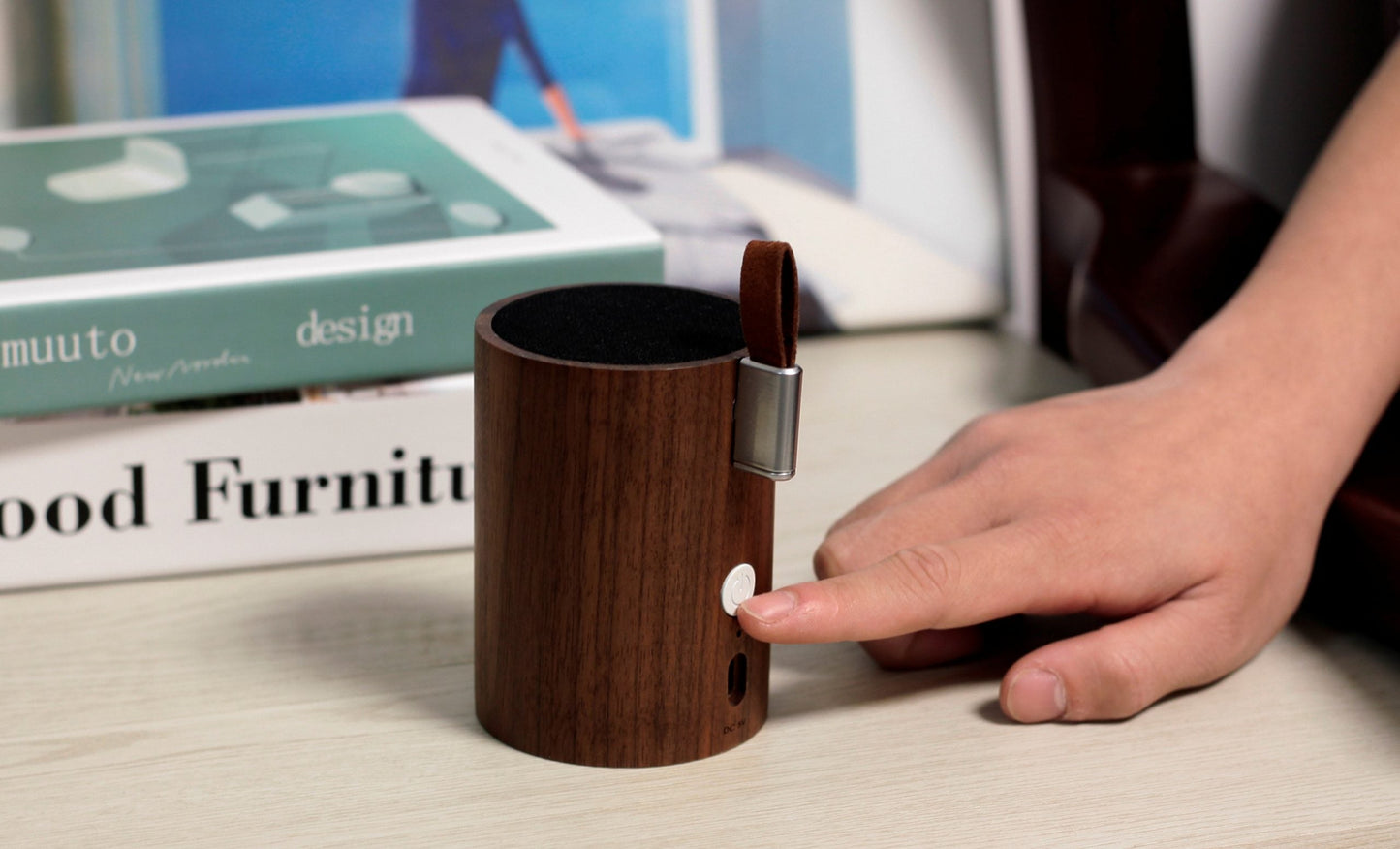 Walnut wood drum speaker with front button panel and metal side handle