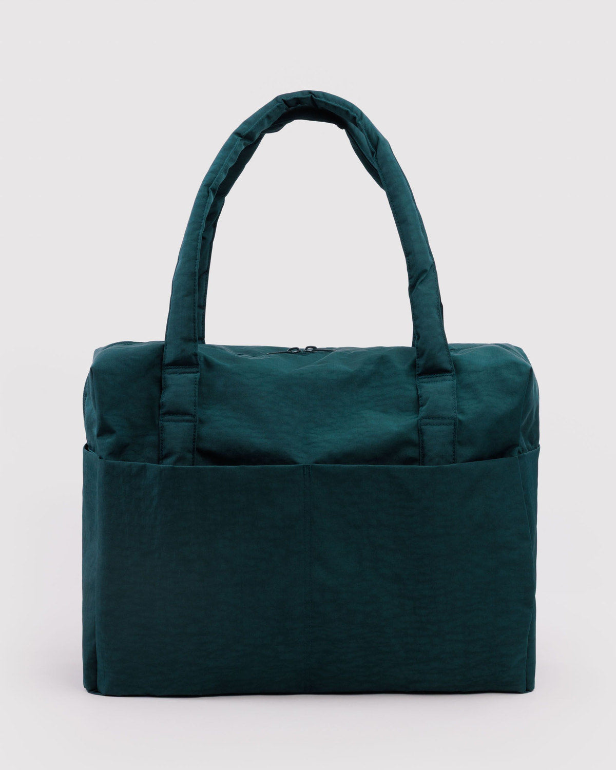 Carry-on travel bag in deep teal with short top handles and soft structured body.