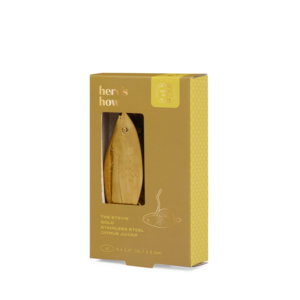 Gold fish-shaped citrus juicer in its gift box packaging.