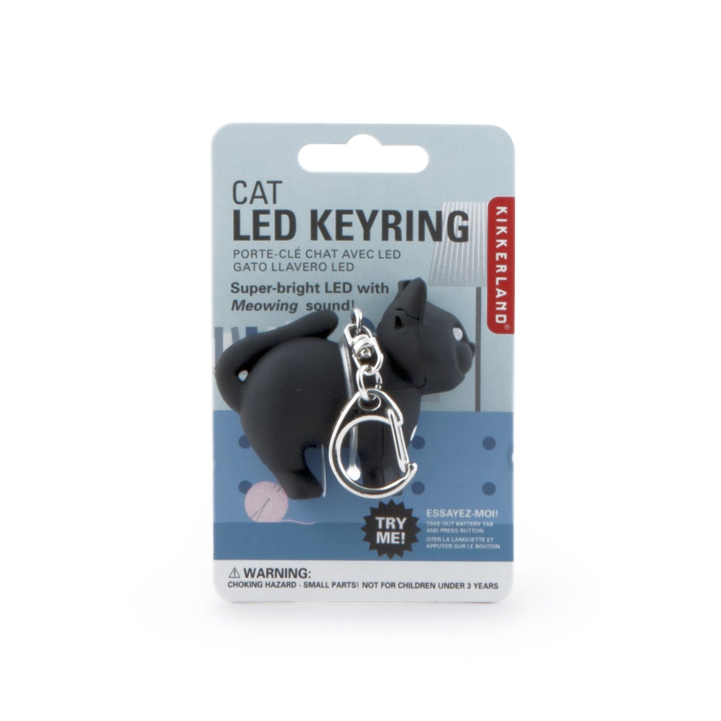 Black cat LED sound keychain with metal clip, shown on retail card
