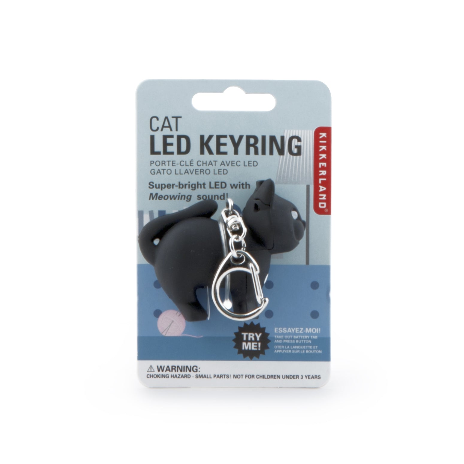 Black cat LED sound keychain with metal clip, shown on retail card
