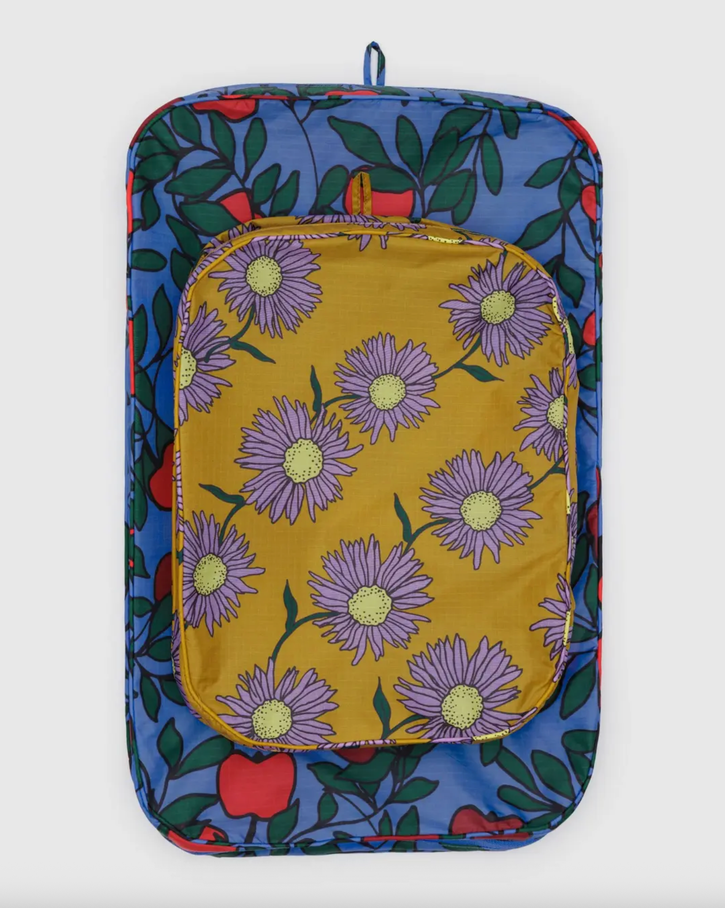 Large packing cube set with blue leaf border and yellow daisy pattern, zipped