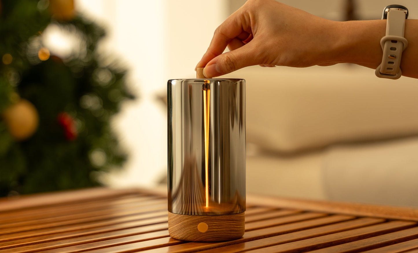 Drift Light glass cylinder table lamp with warm glow and walnut base