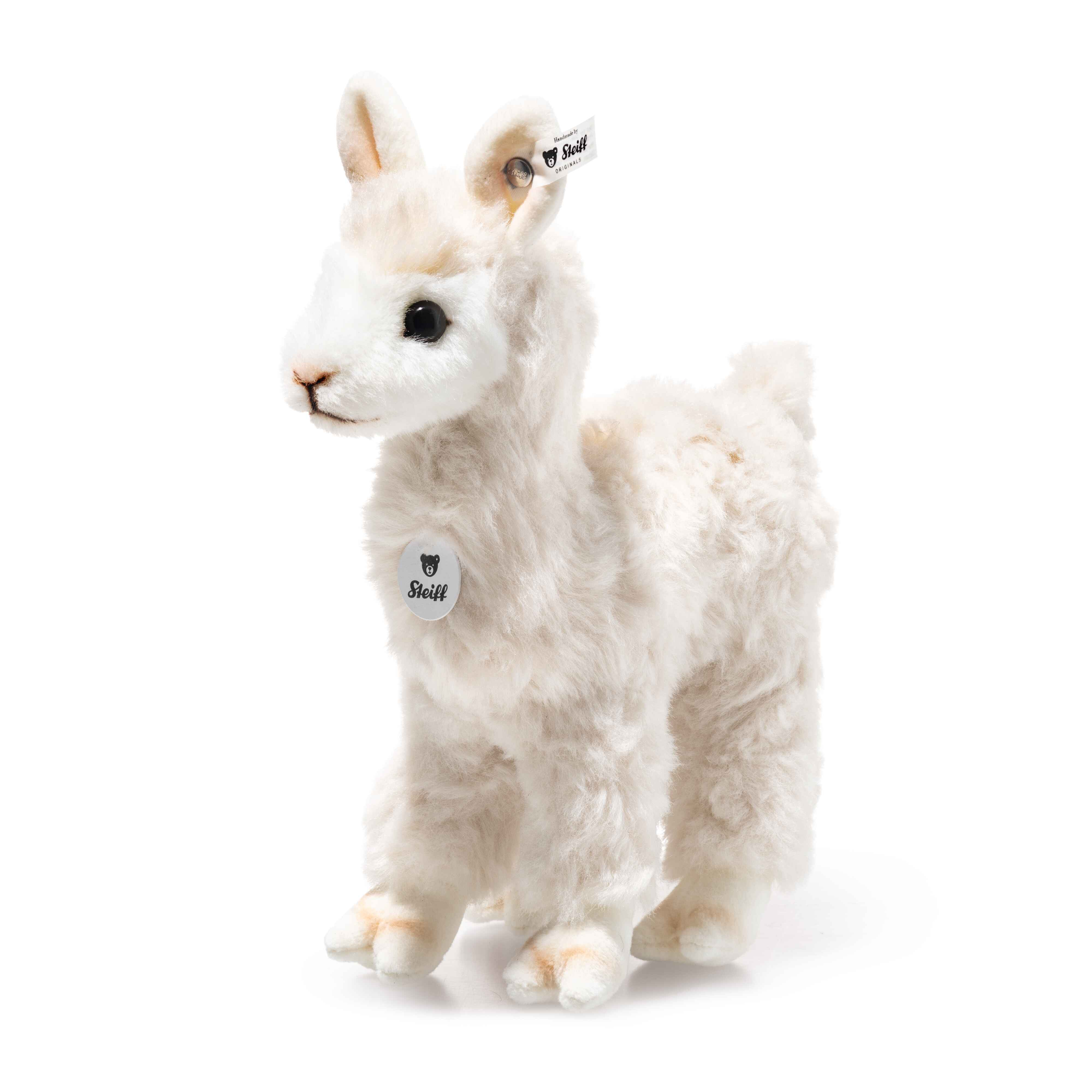 Alpaca plush toy with soft white fur, stitched eyes, and round brand tag