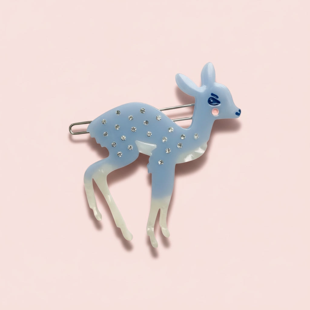 Blue deer hair clip with rhinestone dots and metal bar fastener