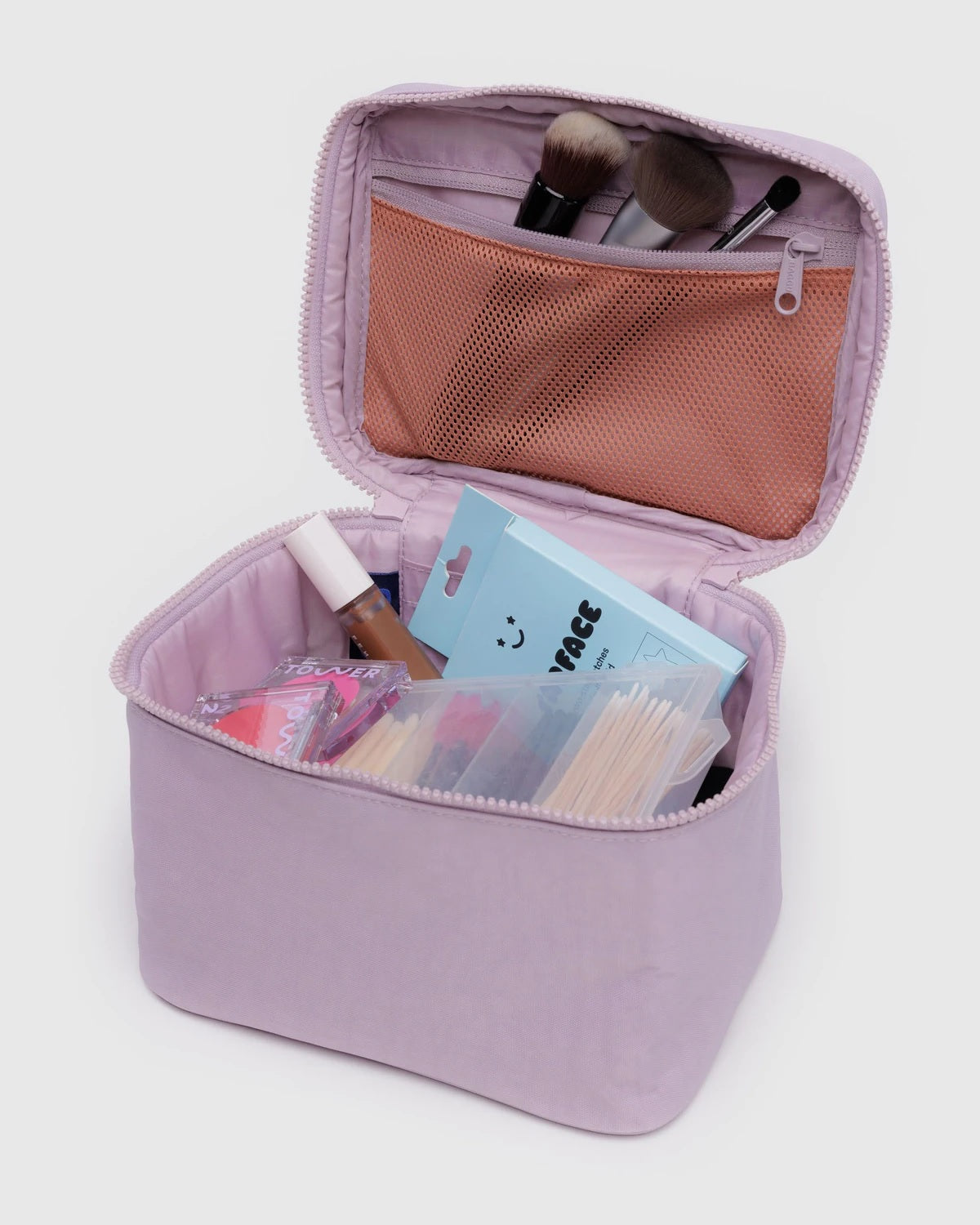 Large lavender cosmetic case open with mesh pocket and makeup tools inside.