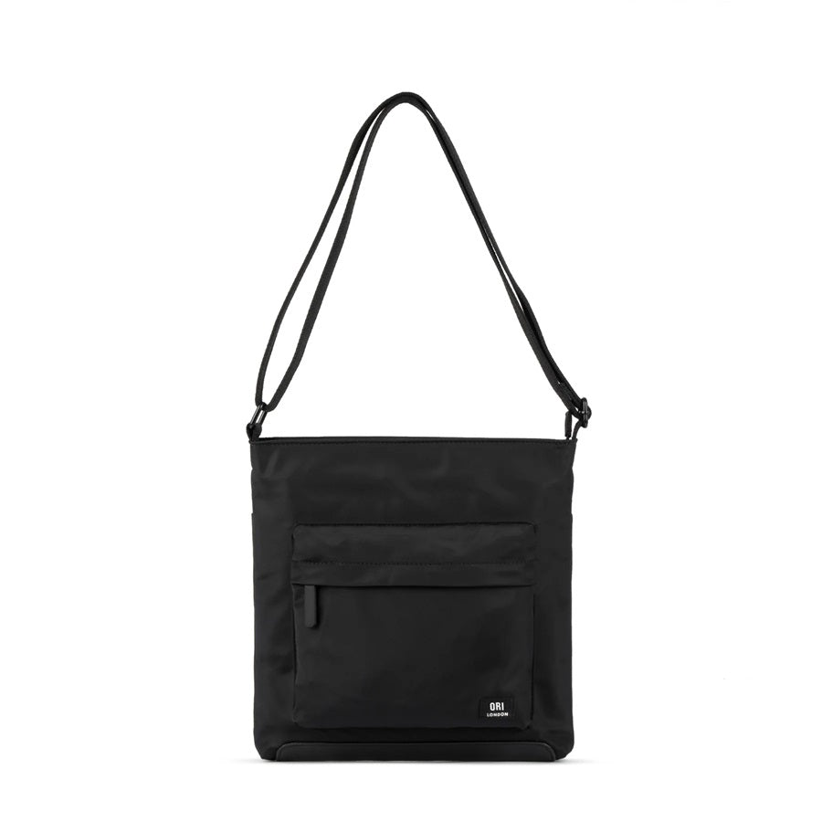 Sustainable nylon crossbody bag in black with zip front pocket
