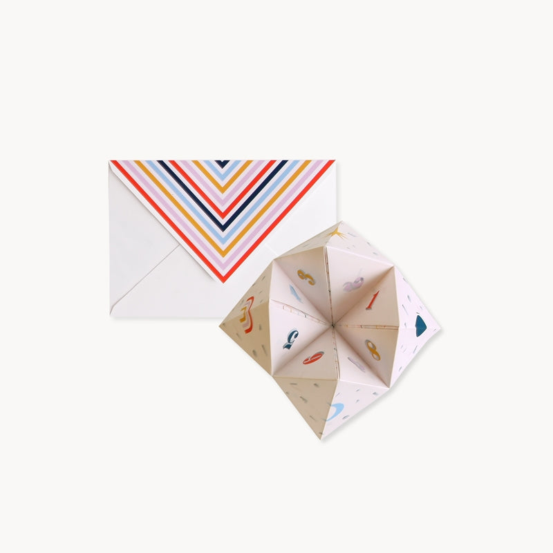 Pop-up greeting card with rainbow chevron front and colorful folded paper cube
