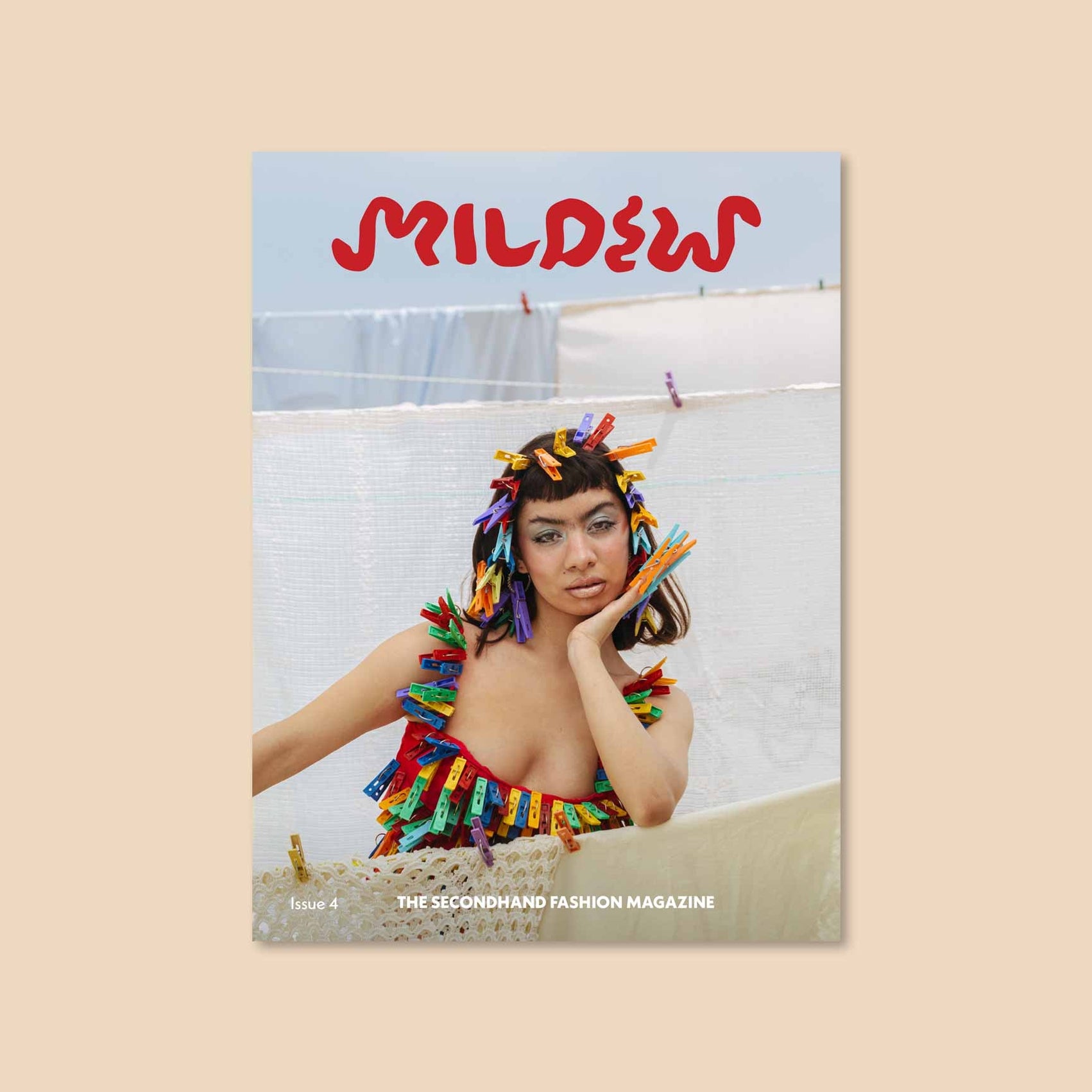 Mildew Magazine Issue 4 cover with colorful portrait and bold logo text