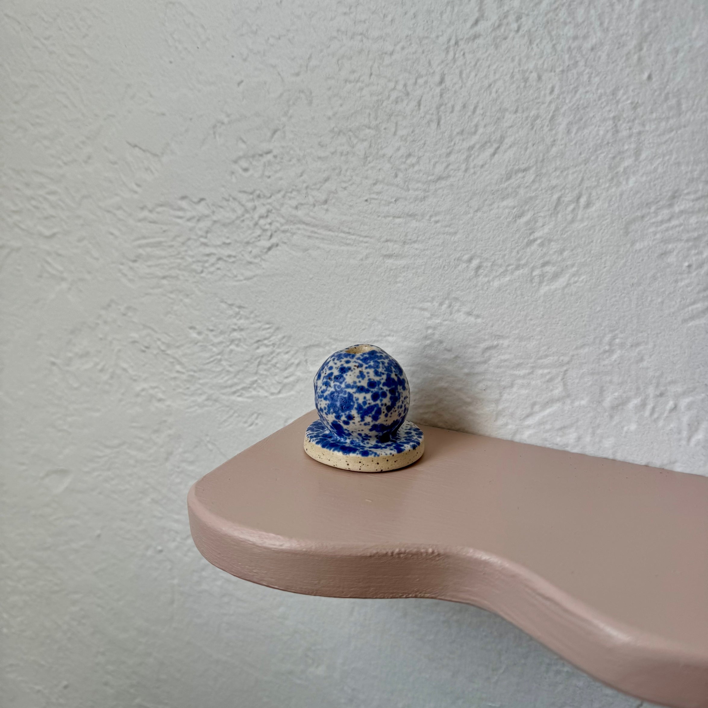 Blue speckled ceramic incense holder with dome sphere on flat base