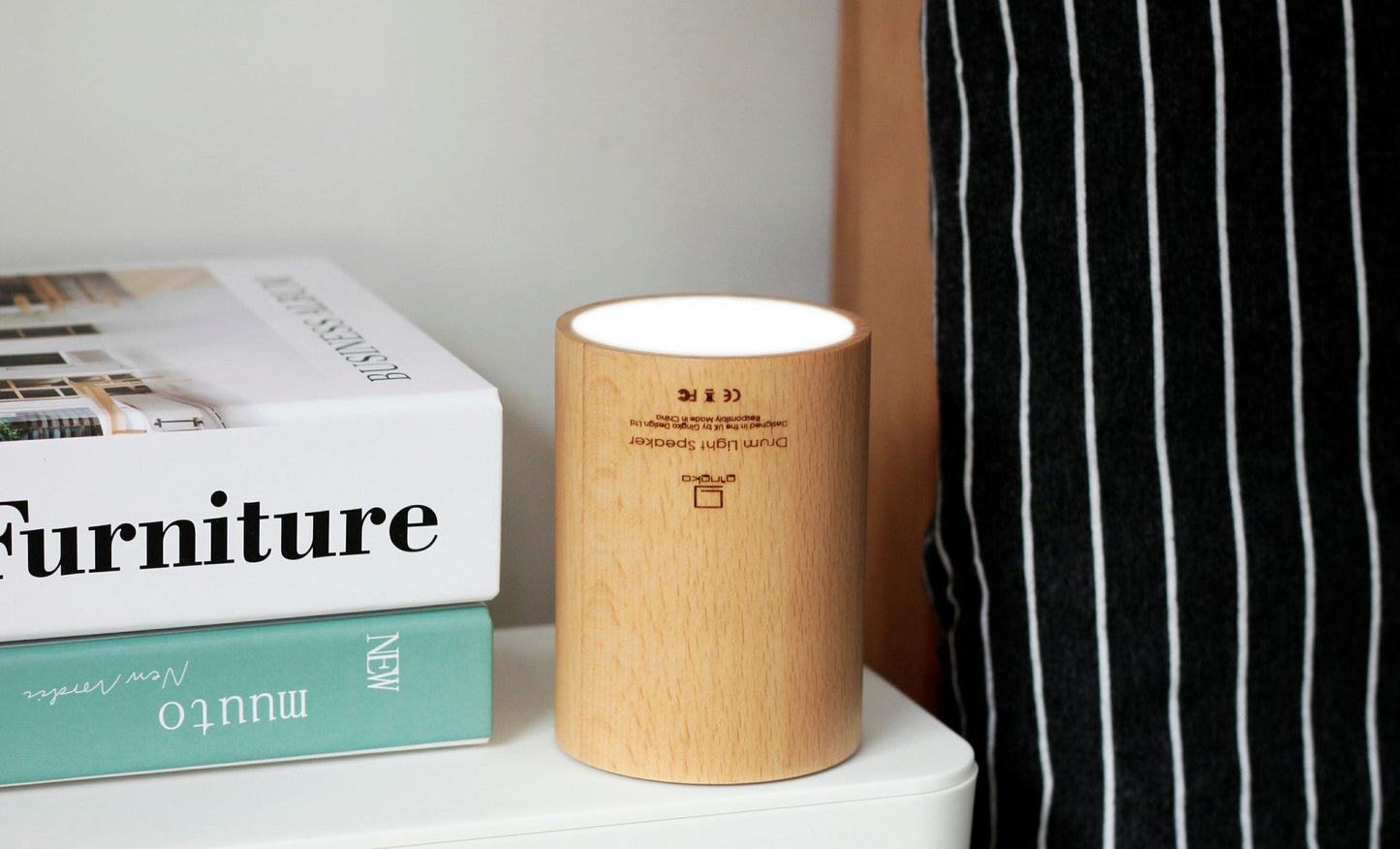 Beech wood drum speaker with top light glow and metal side latch