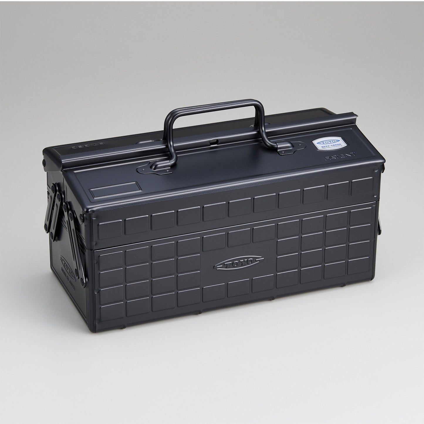 Black steel cantilever toolbox with top carry handle and latch on front.