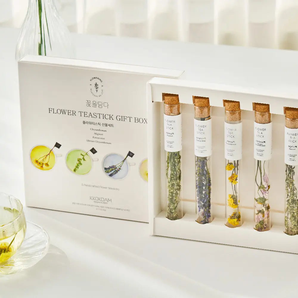 Flower tea stick gift box with five clear vials of dried flowers inside