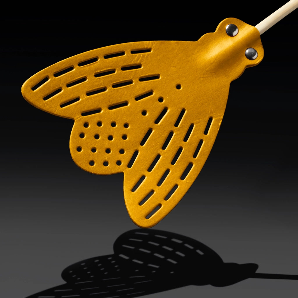 Essey tan fly swatter, large perforated head with circular holes and angled handle
