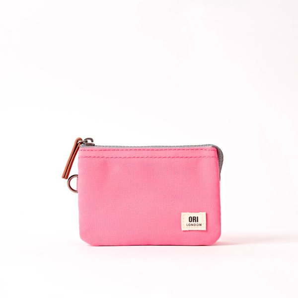 Small canvas zipper pouch, pink with orange-brown zipper pull and ORI London patch