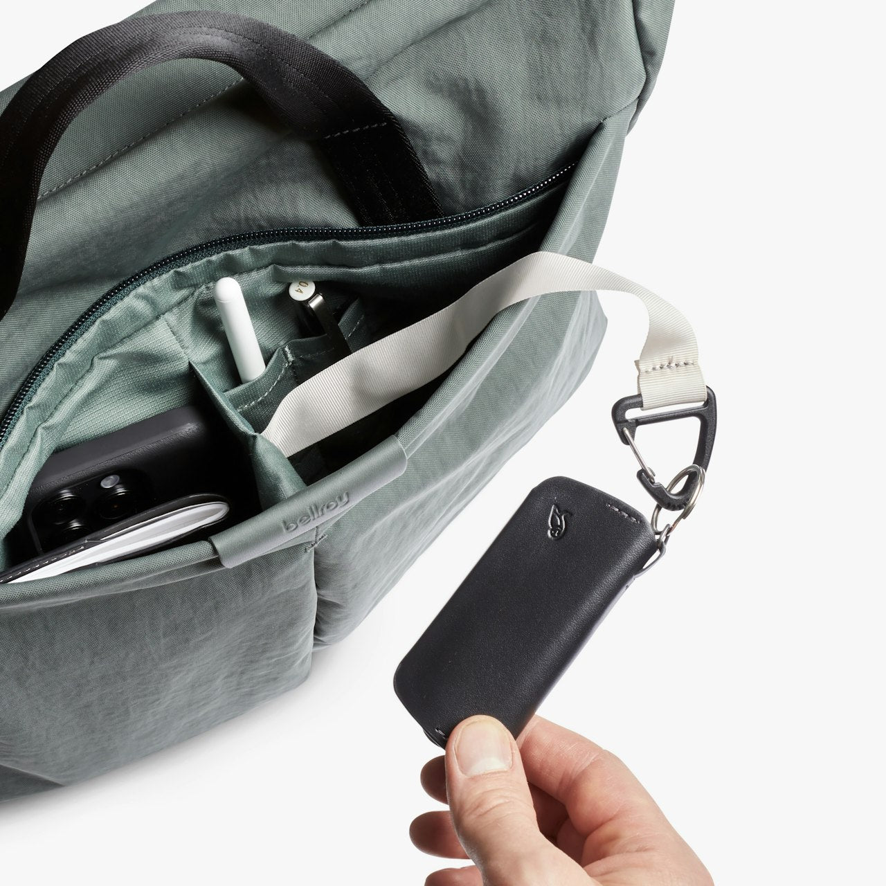 Open Everglade green bag interior with zipper pocket and organizer sections.