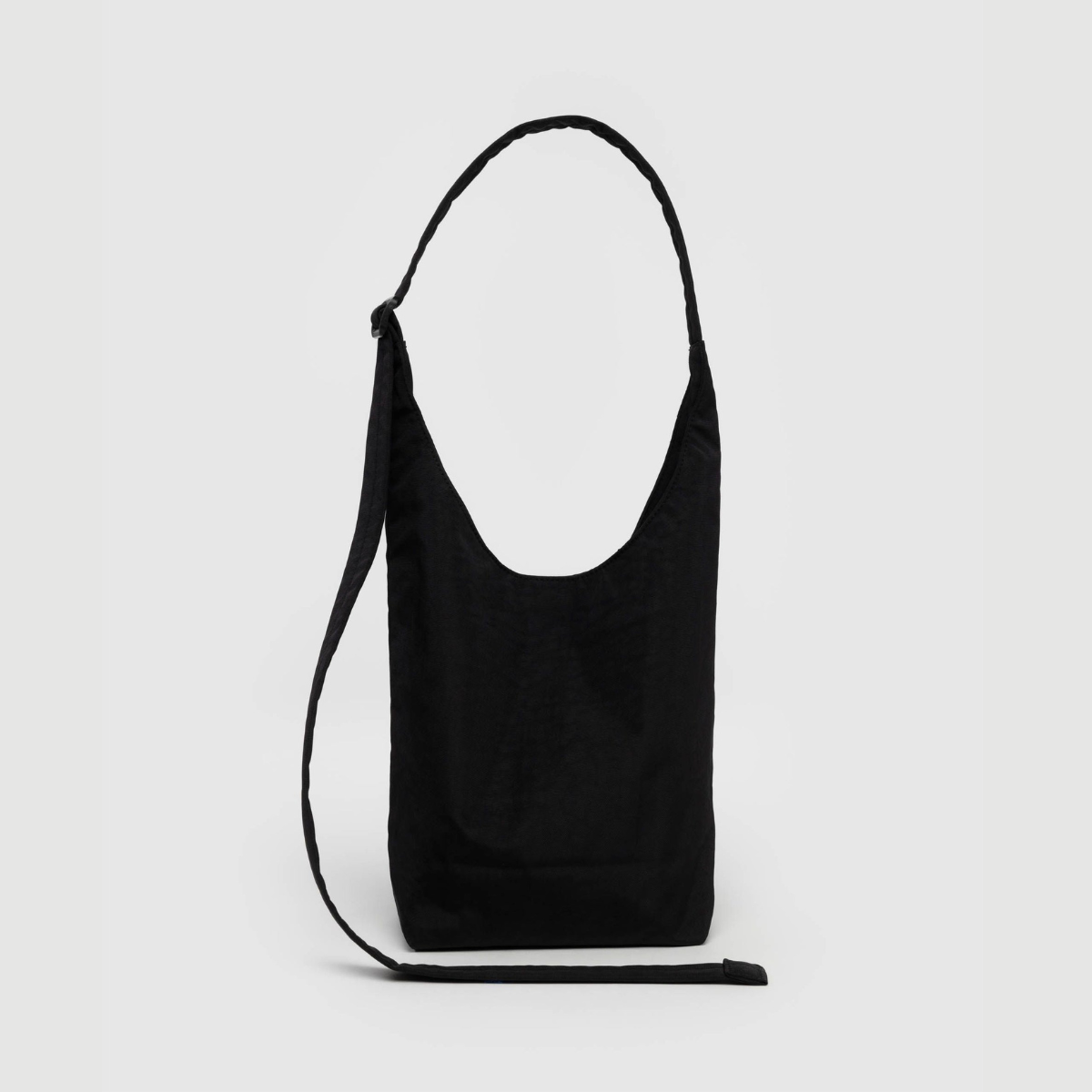 Small nylon sling bag, black with top opening and adjustable shoulder strap