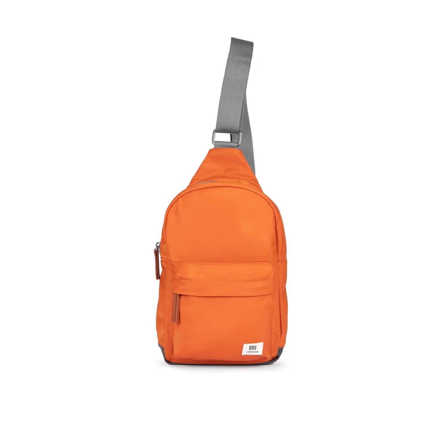 Burnt orange recycled nylon sling bag with front zip pocket and gray adjustable strap