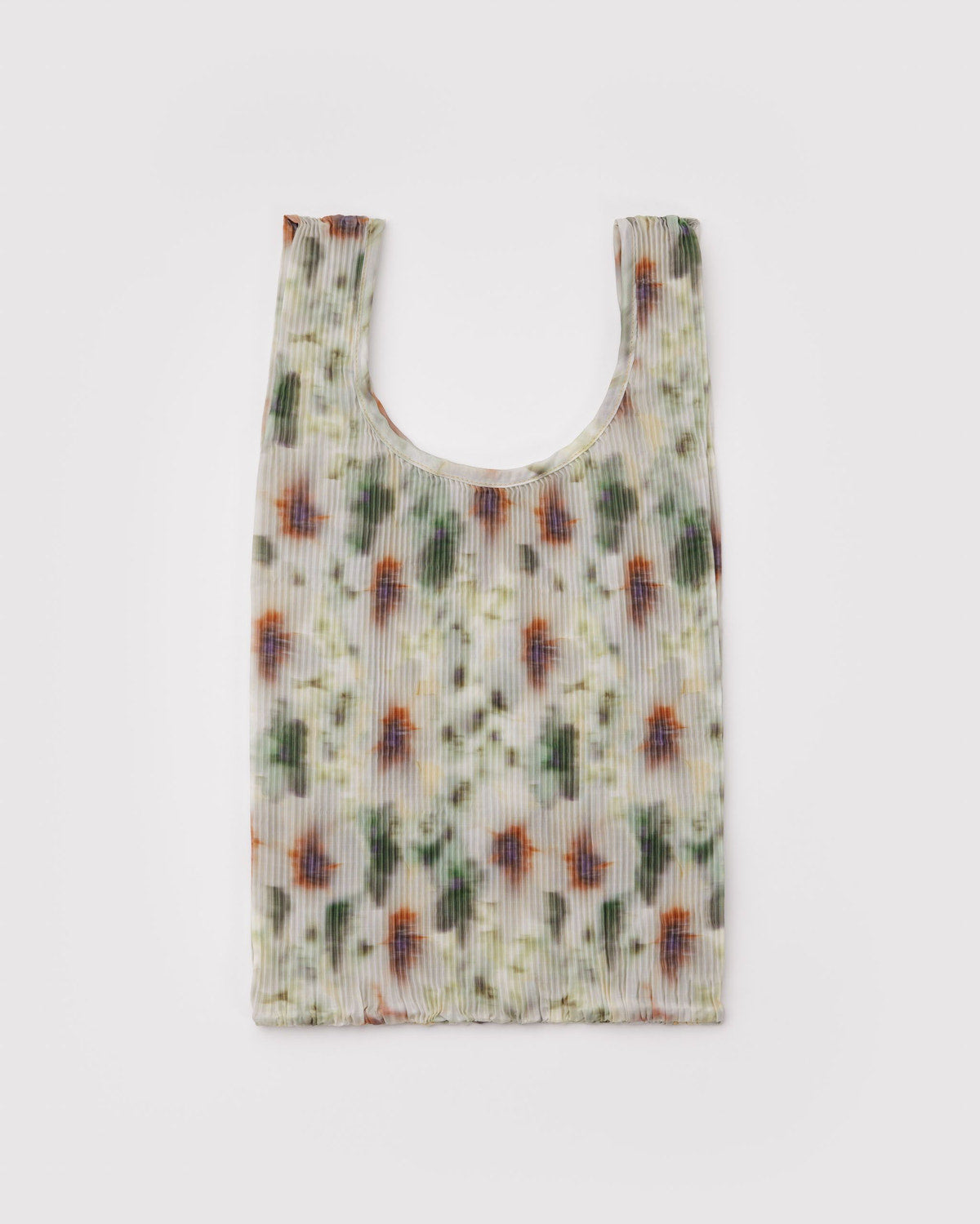 Pleated Baggu tote with light cream watercolor floral print and wide U-shaped opening