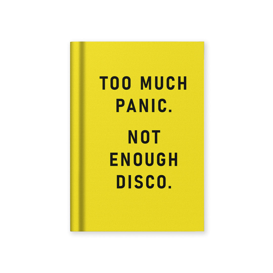 Hardback notebook with bright yellow cover and bold black motivational text