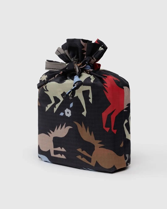 Single drawstring pouch with dark animal print and red accents