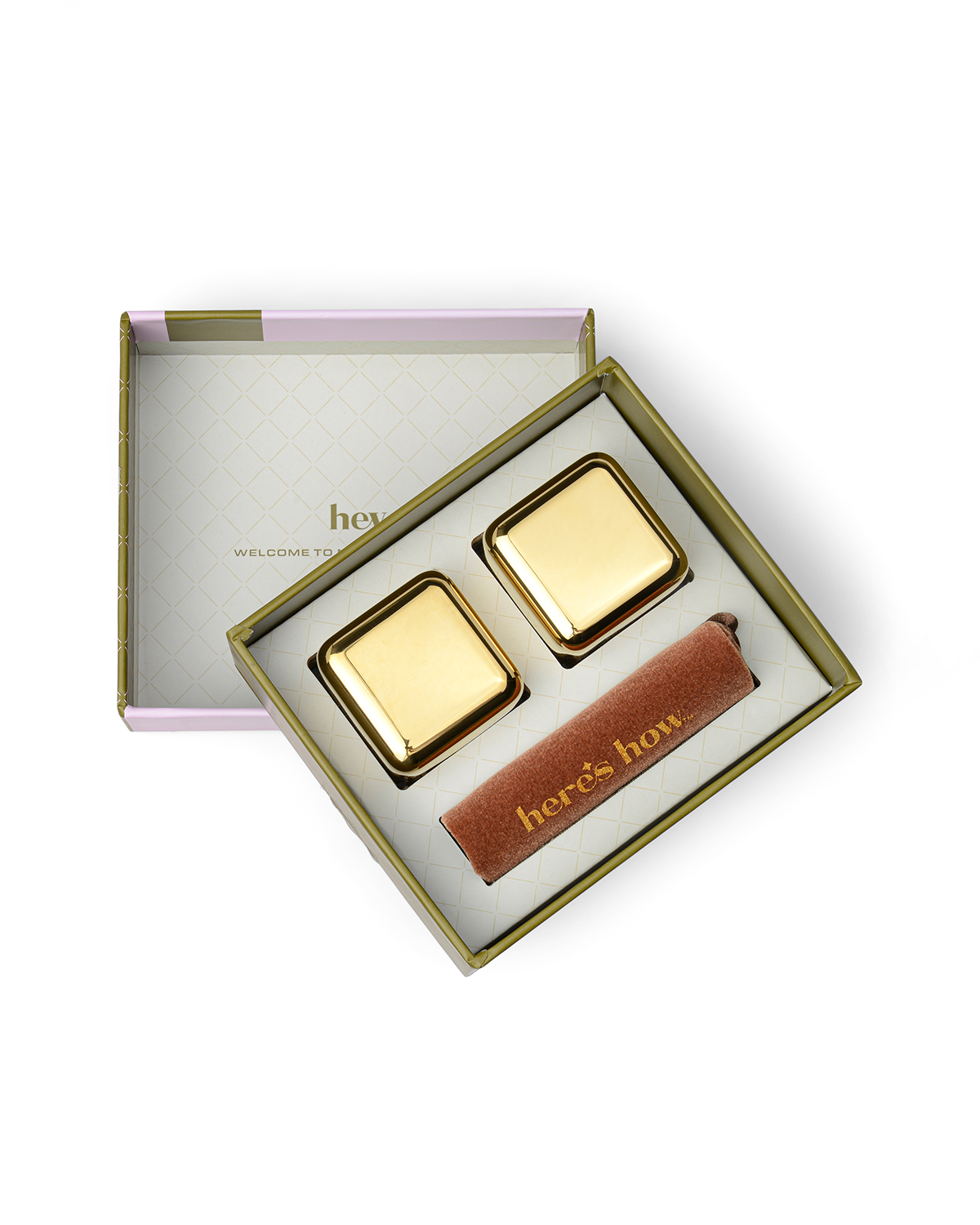 Gold cocktail chiller cubes in gift box with drawstring pouch