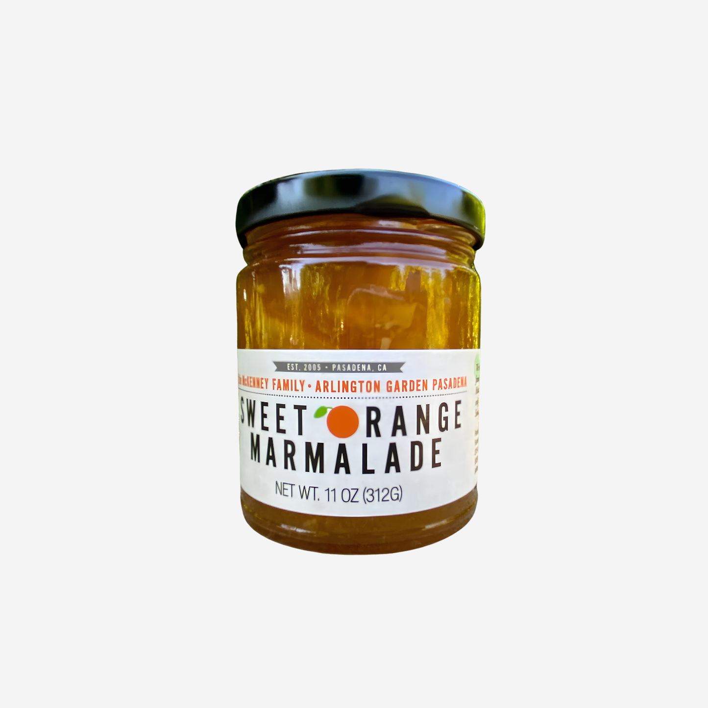 Orange marmalade jar with amber preserves and green screw-top lid