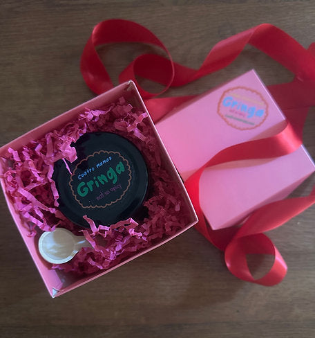 Chili crisp gift box with pink ribbon and round Gringa logo seal
