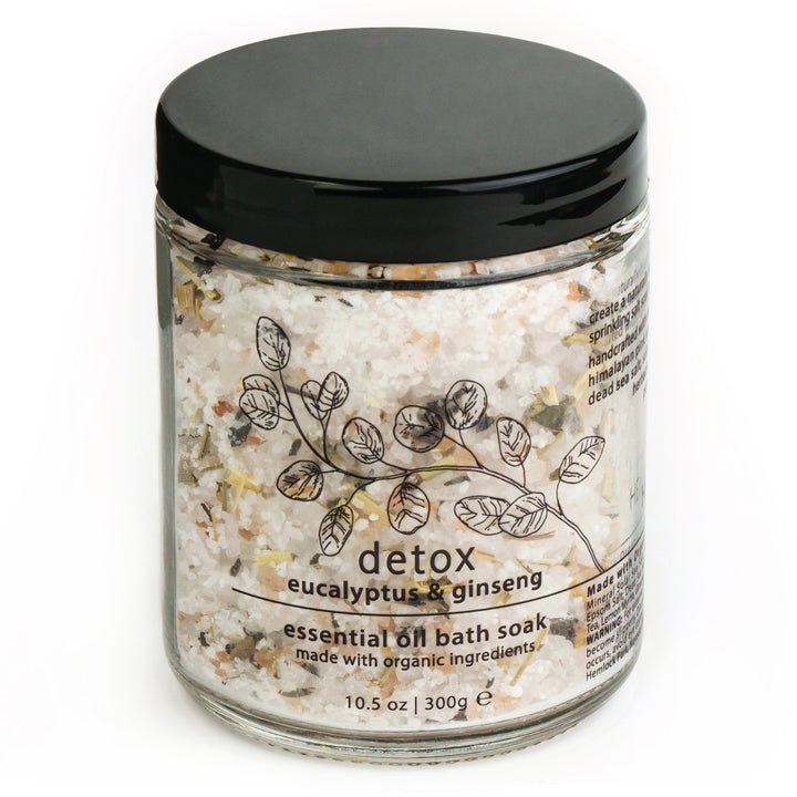 Detox bath soak jar with eucalyptus & ginseng label and bath crystals, black lid
