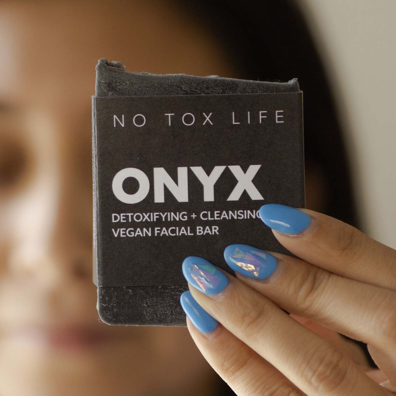 Onyx detoxifying vegan facial cleansing bar, dark gray, with NO TOX LIFE label