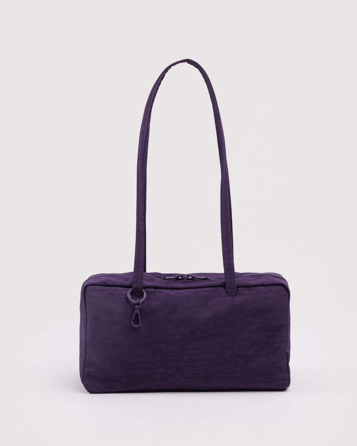 Purple nylon bowler bag with top zipper and short carry handles
