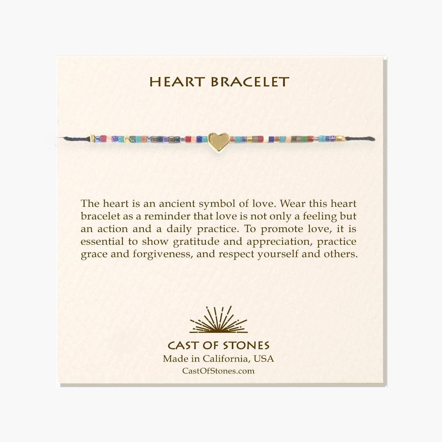 Bright beaded bracelet featuring a centered gold-tone heart charm and woven bead band.