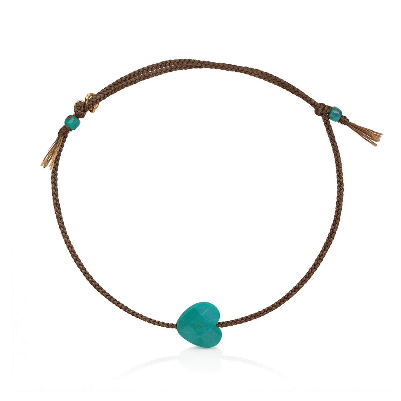 Brown cord bracelet with turquoise heart charm, gold clasp, and tassel ends