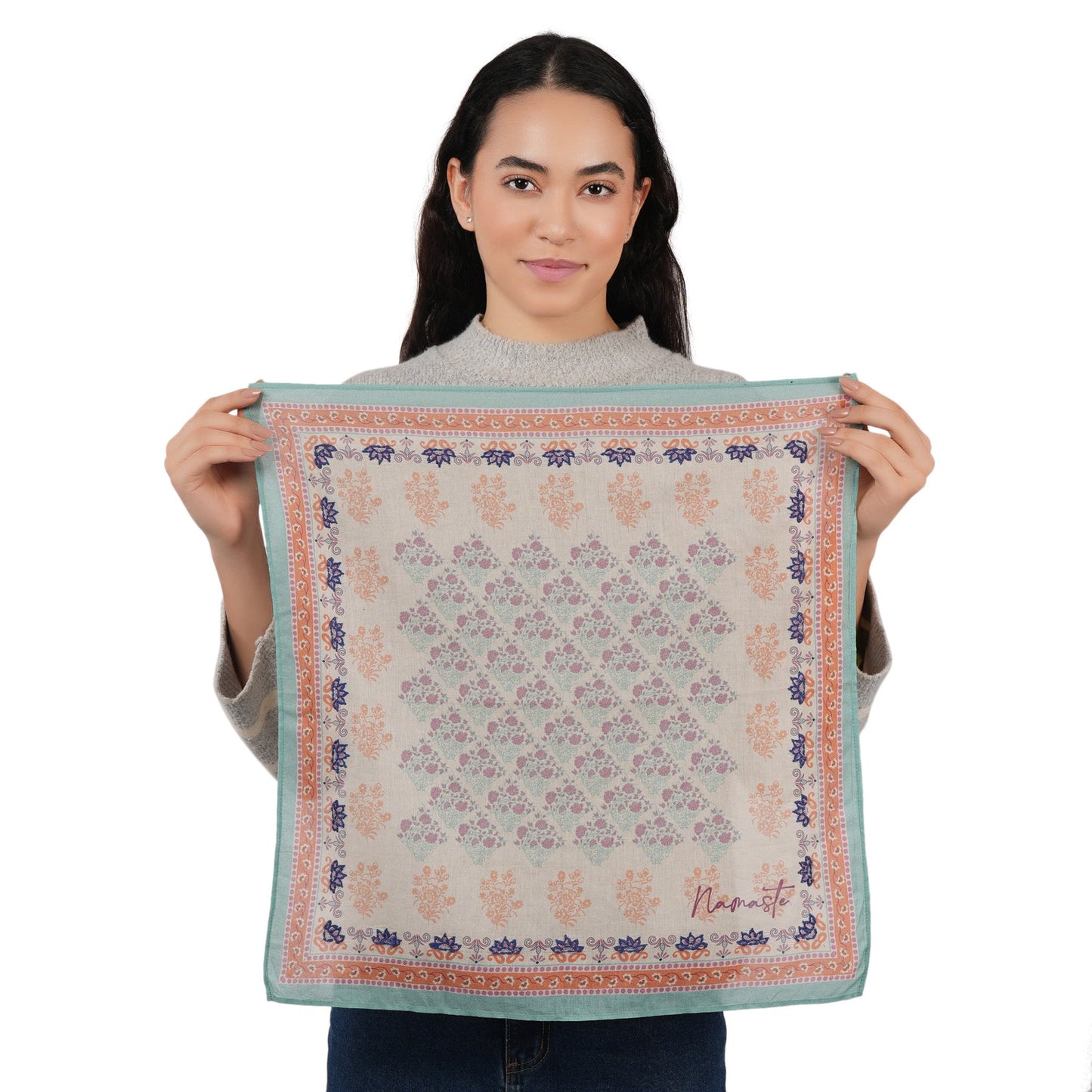 Beige floral embroidered scarf, square design, blue border with orange trim.