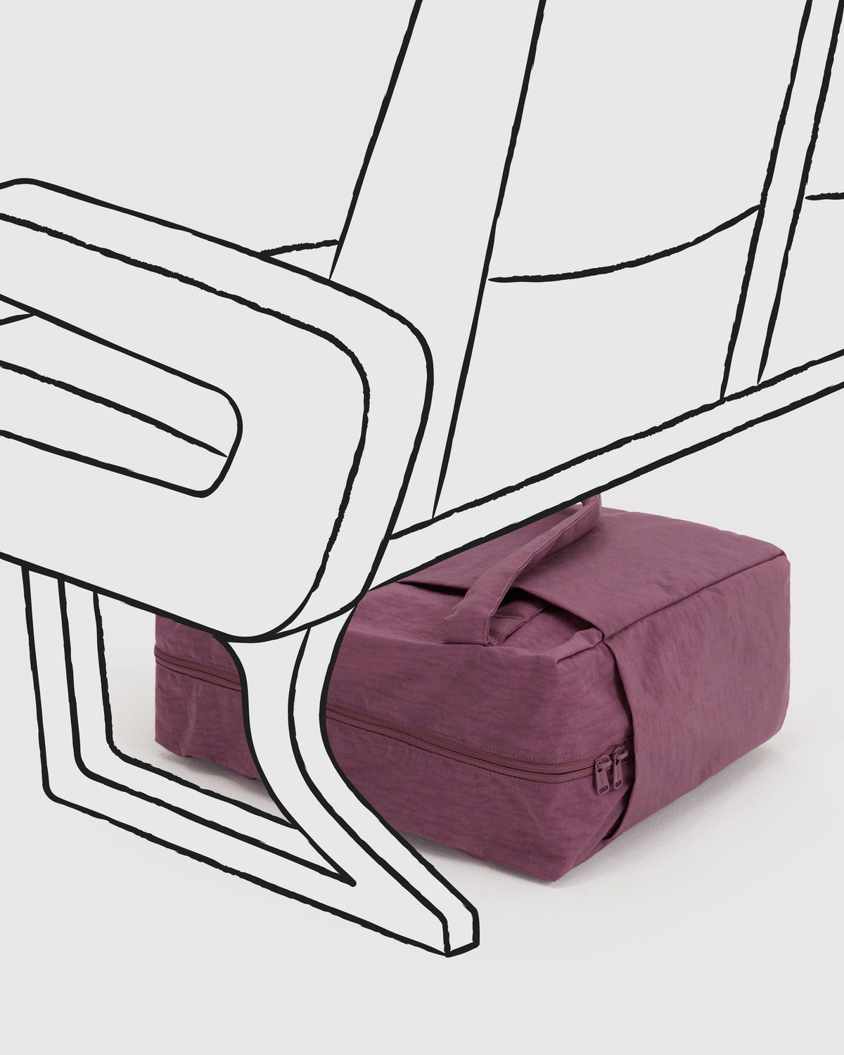 Purple foldable tote bag on a rolling suitcase with top handle and front zipper pocket.