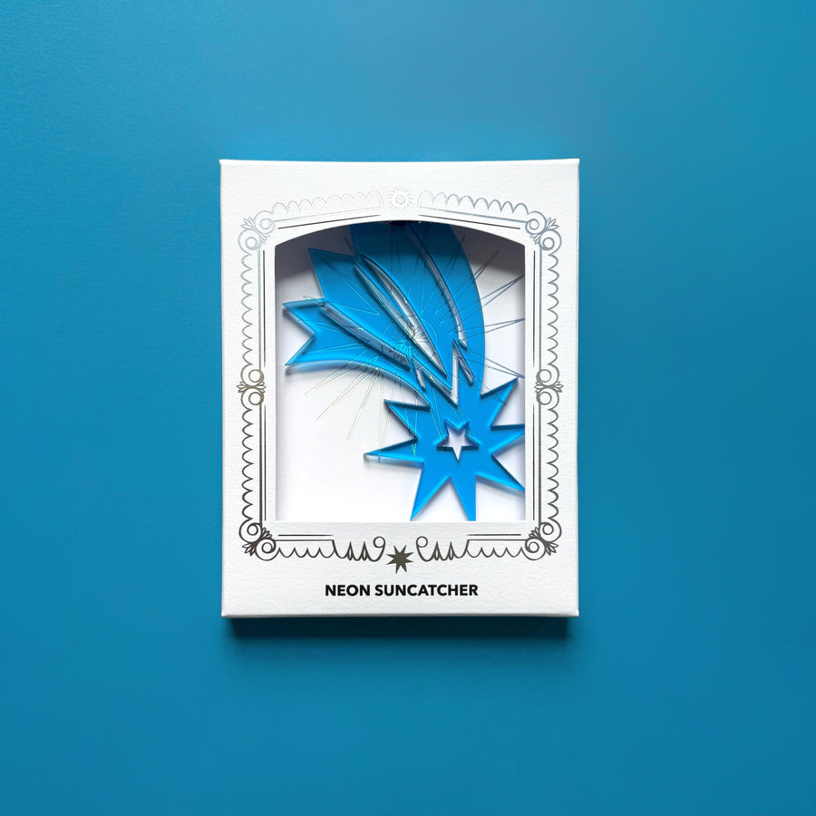 Blue star neon acrylic suncatcher with layered star and lightning shapes in a frame