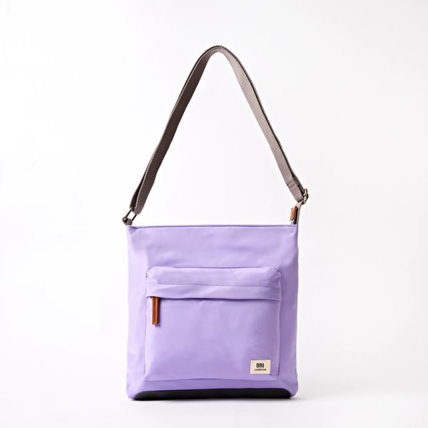 Lavender recycled canvas crossbody bag with front zip pocket and adjustable strap