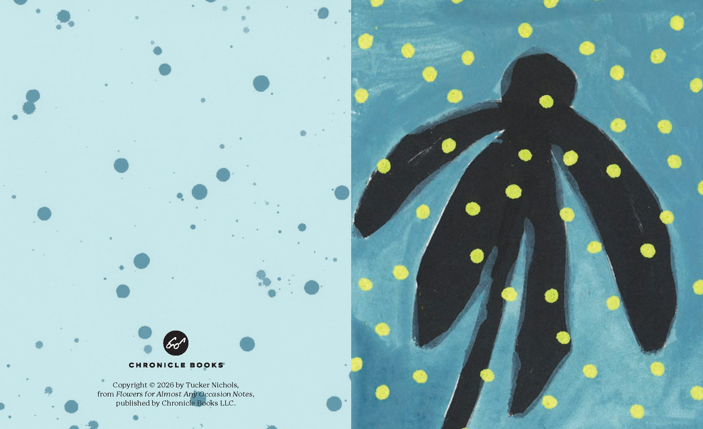 Blue and light patterned page spread with a black flower silhouette and yellow dots