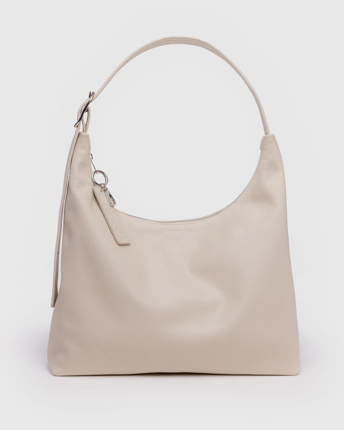 Light beige recycled leather shoulder bag with top handle and metal keychain charm
