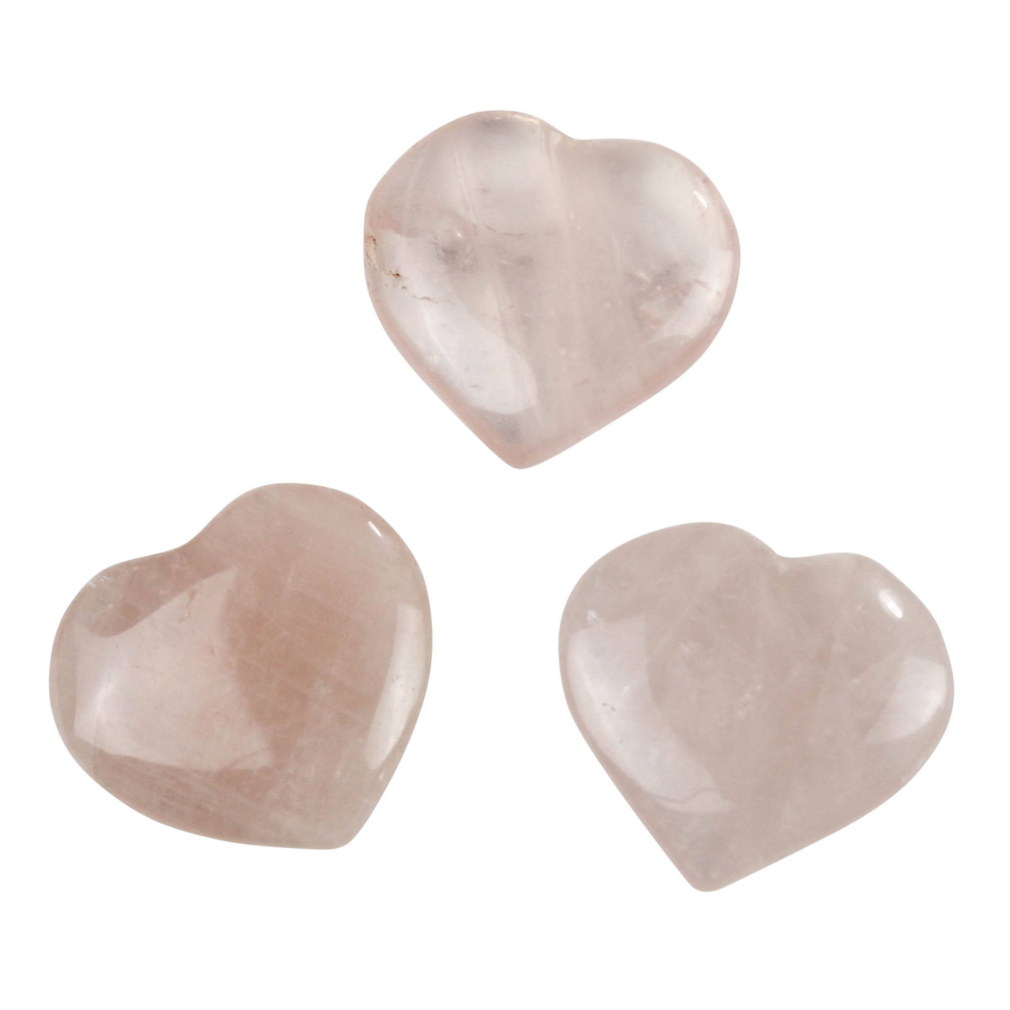 Rose quartz heart gemstones, three polished heart-shaped stones