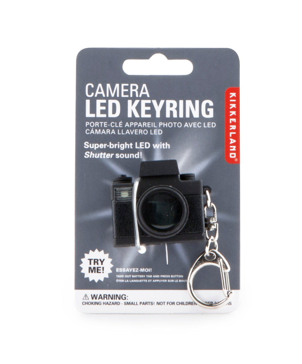 Camera-shaped LED keychain on retail card, featuring lens detail and metal key ring