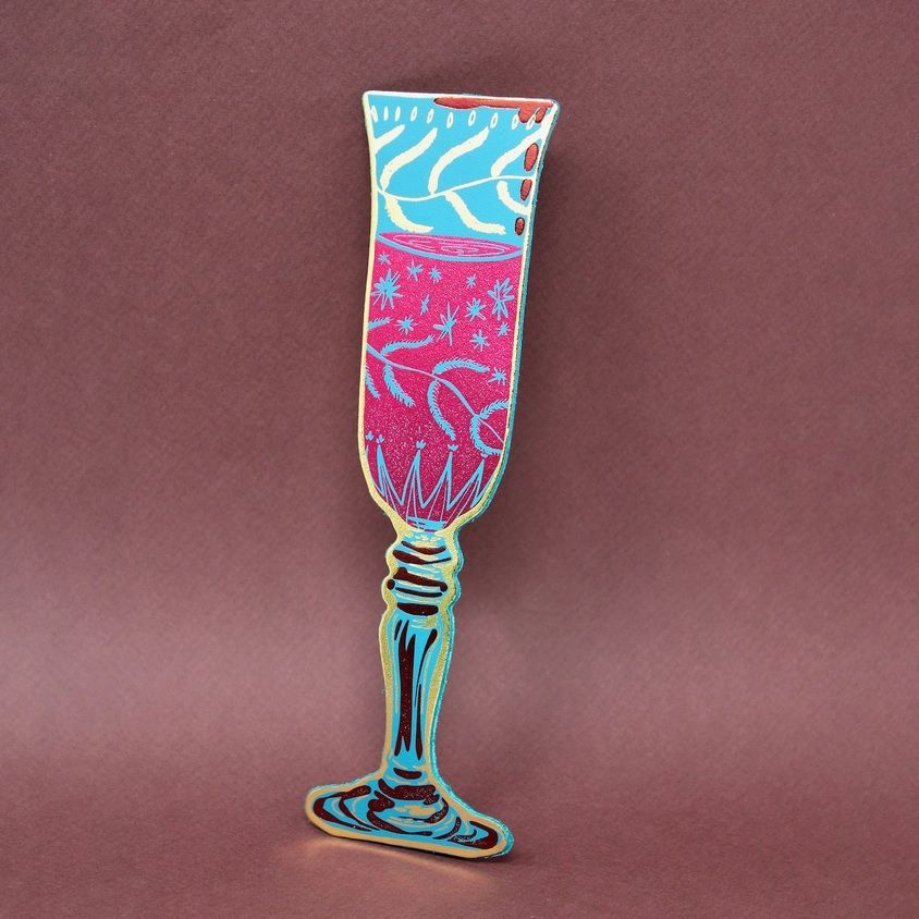 Turquoise wine glass shaped bookmark with pink and blue patterned top