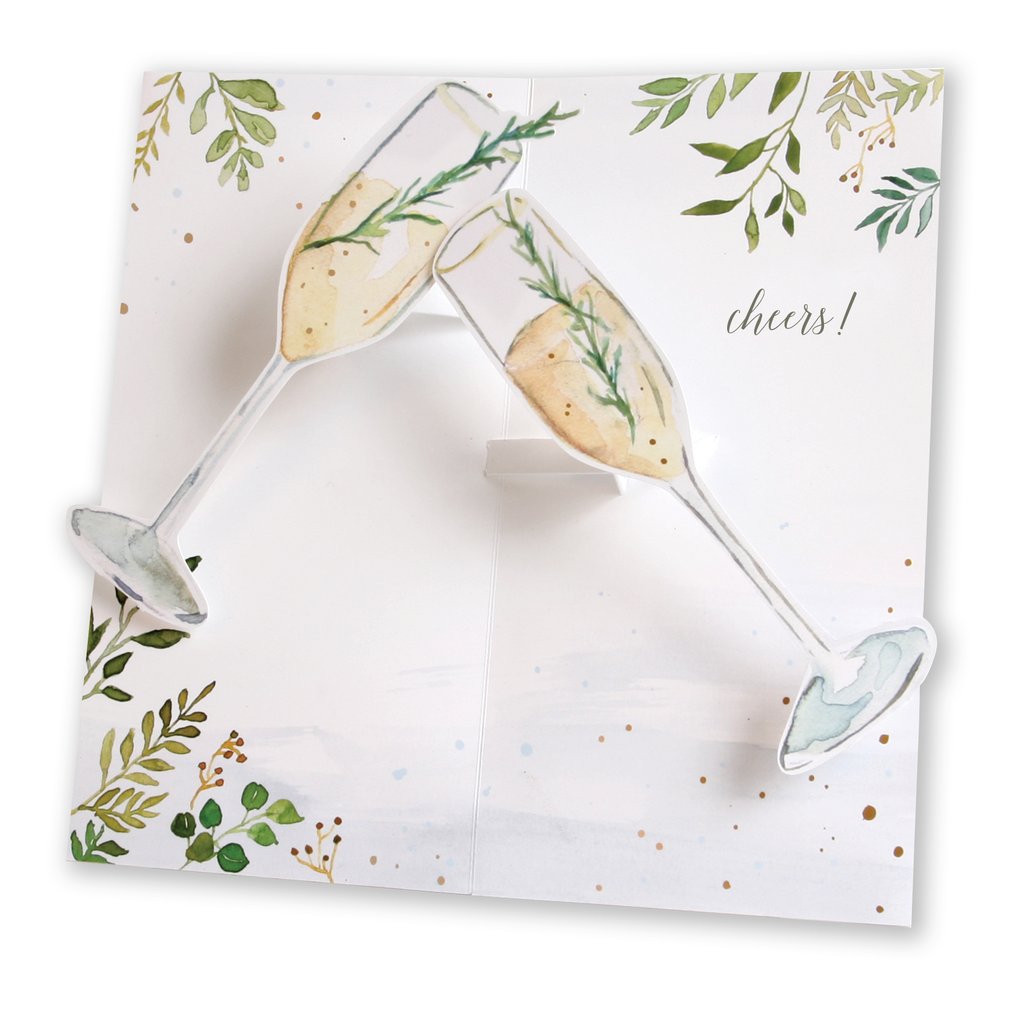 Pop-up champagne toast greeting card showing two illustrated glasses and “cheers!”