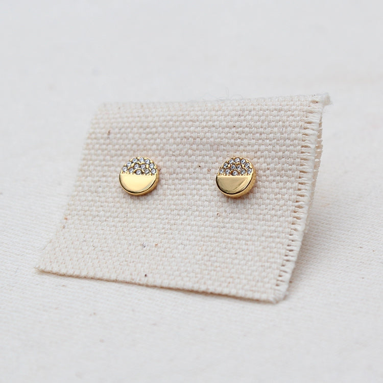Pave circle stud earrings in gold-tone metal with clear stones