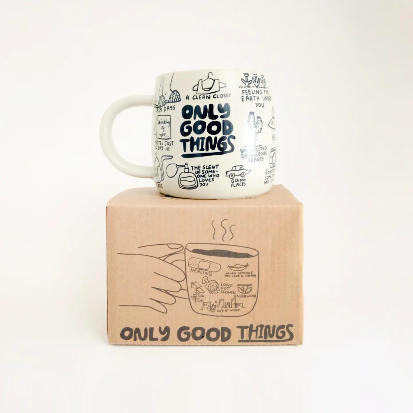 Cream ceramic mug with 'Only Good Things' lettering and scattered micro-text