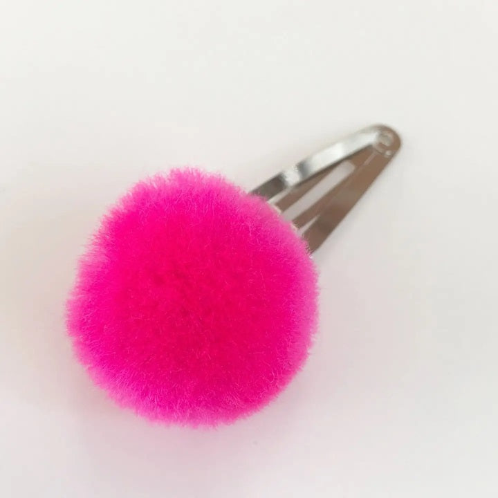 Hot pink pom-pom hair pin with silver metal clip