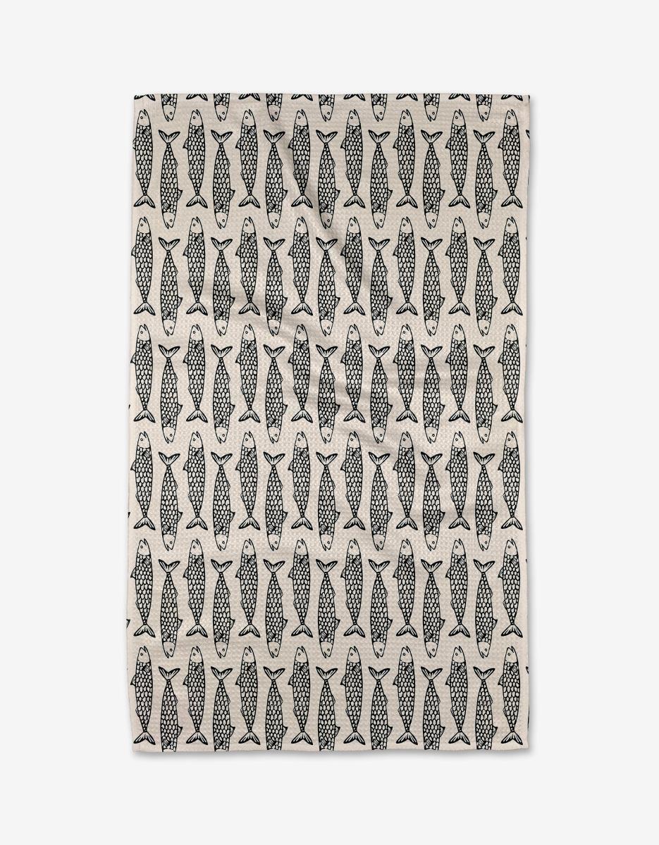 Fish friends tea towel with repeating black and white fish pattern