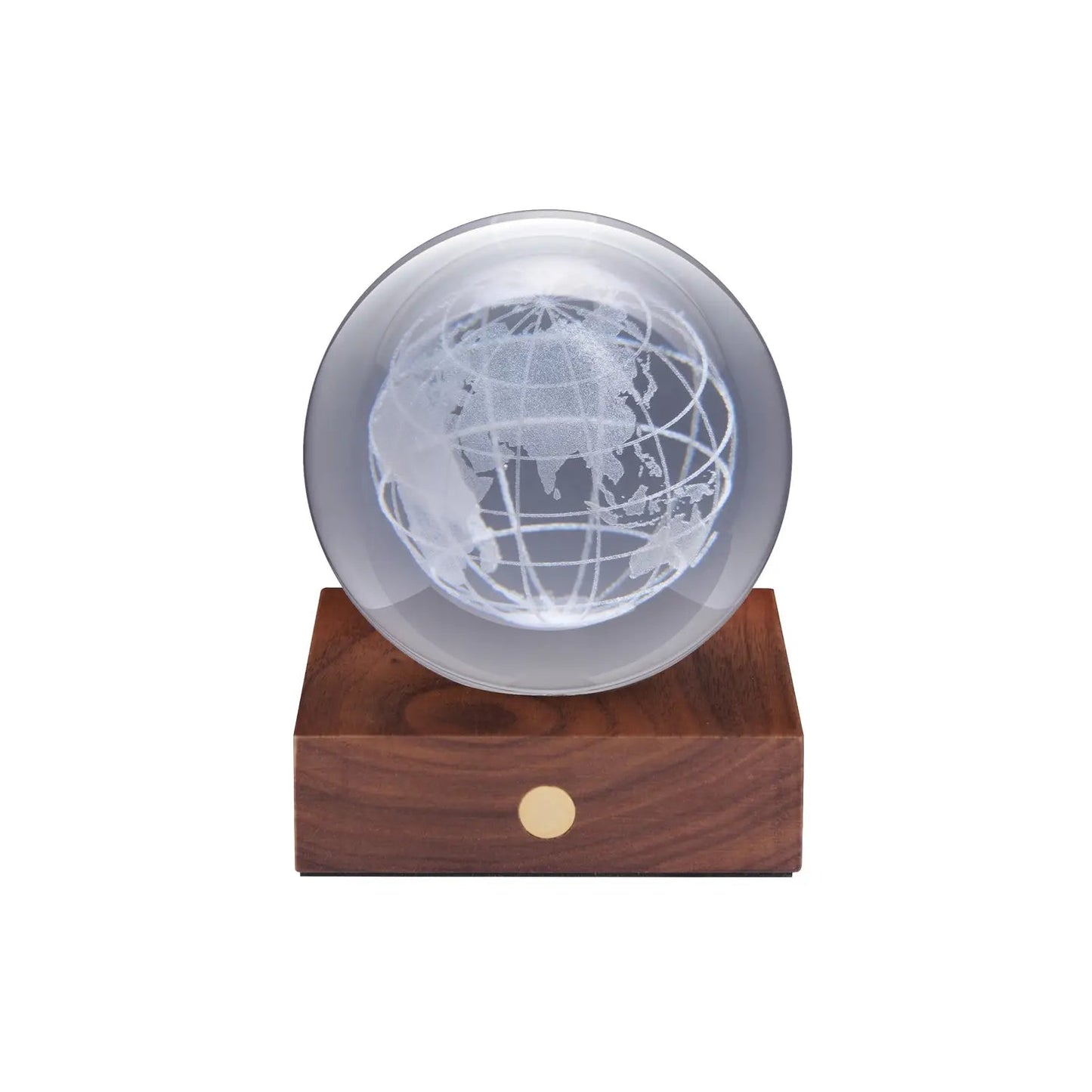 Globe crystal night light on wooden base with white interior glow
