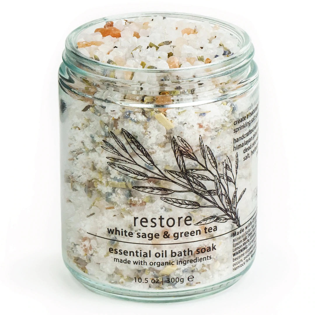 Bath soak jar with clear sides and black lid; white sage & green tea crystals