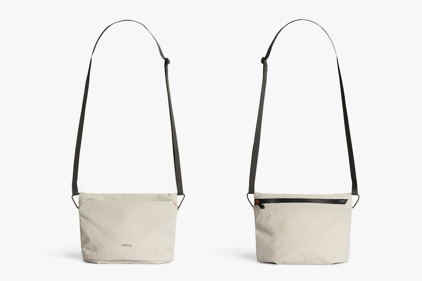 Light ash crossbody bag with black webbing handles and zip-top, front and back views